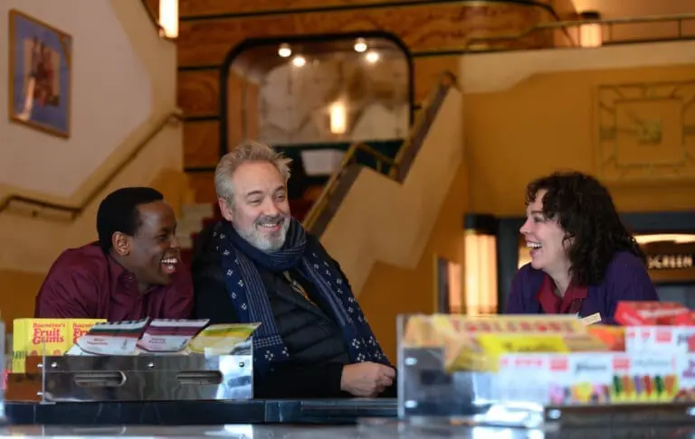 Sam Mendes, Olivial Colman and Micheal Ward going over their scenes and work in the film Empire of Light..