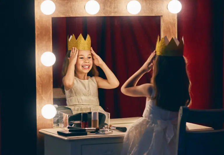 A child actress getting ready to go onstage.