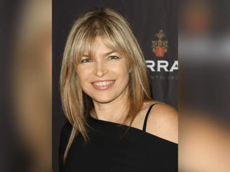 Susie Farris in a black shirt smiling at an awards show.