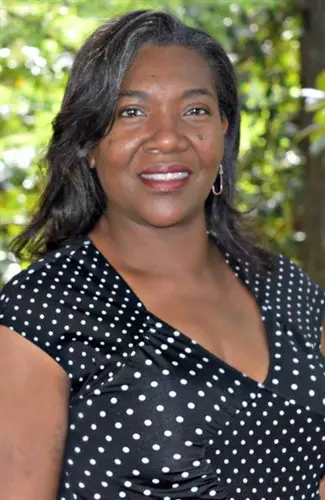 Serilda F. Goodwin smiling outside.
