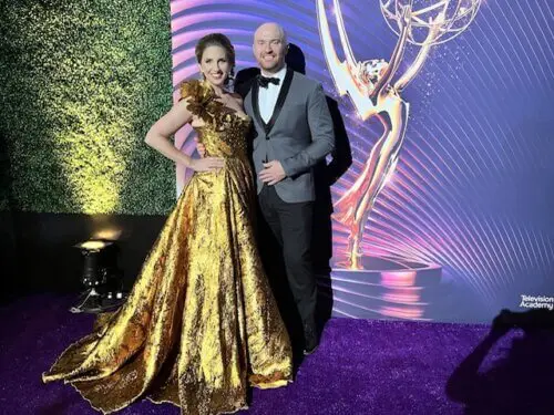 Chase Paris with his wife at the Emmy Awards red carpet event.