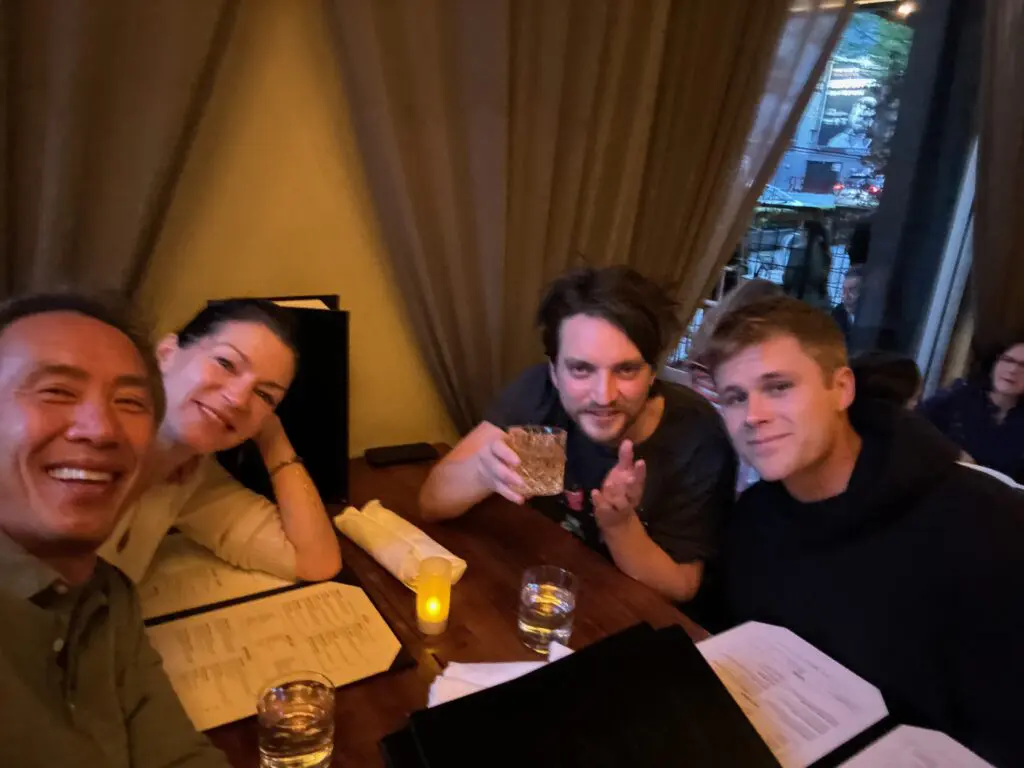 Tinpo Lee and the cast of Final Destination: Bloodlines having drinks and rehearsing the script at someone's house.