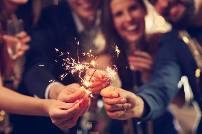 A group of people celebrating the new year by attending a January event on this calendar.