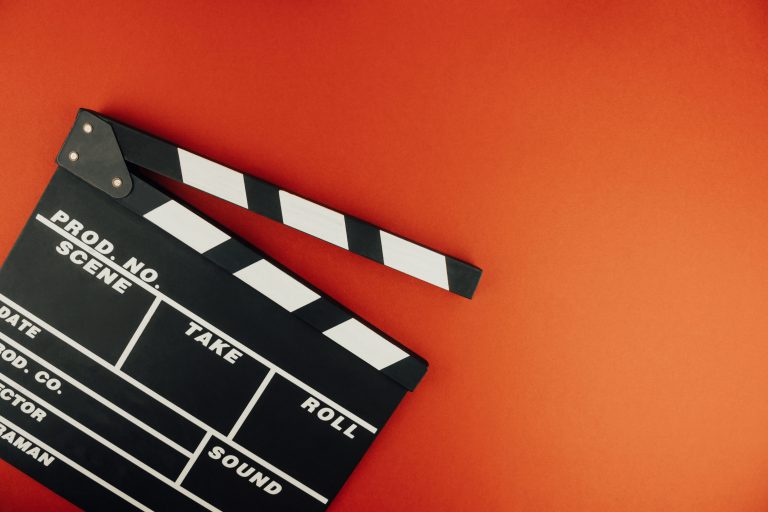 A clapper board before casting director Sunday Boling provides audition advice.