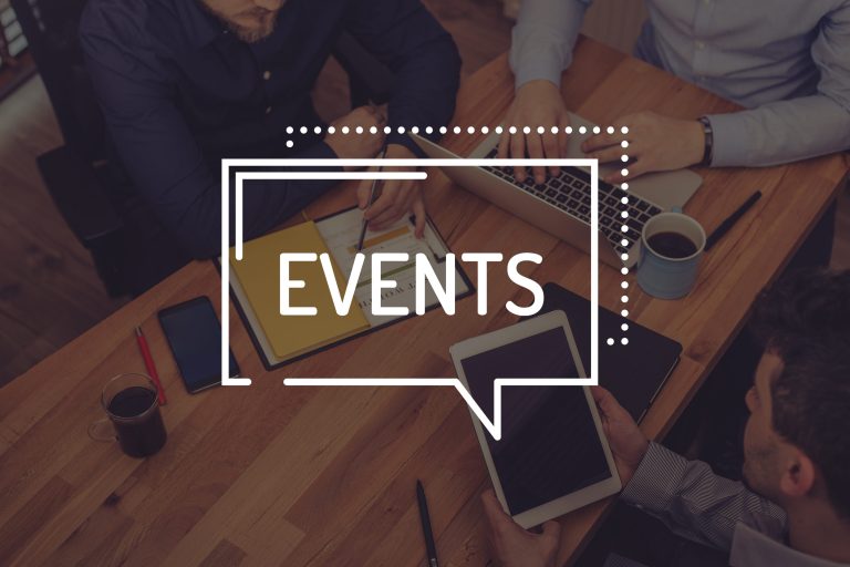 People going over the guide for events to attend in February 2019.