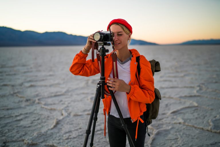 A documentary filmmaker shooting b-roll for their next film.