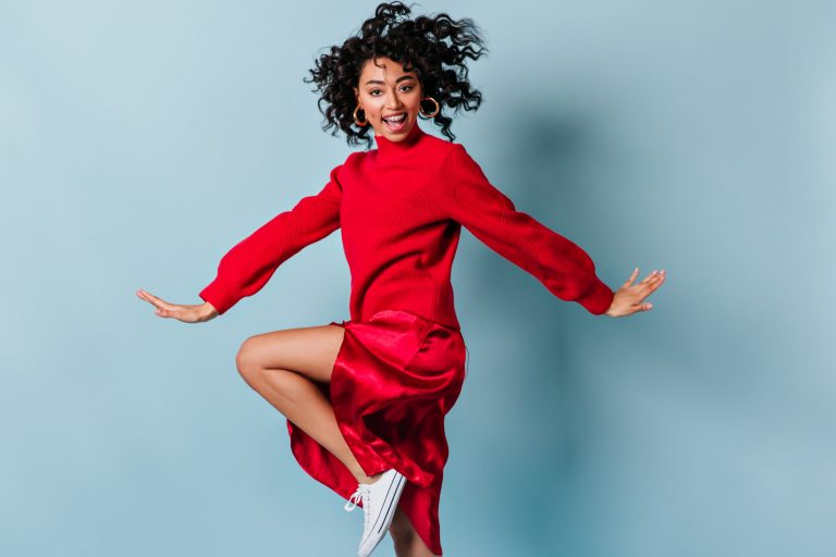 A commercial actress making sure to use body language in her performance.