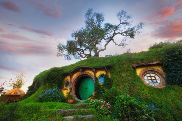 MATAMATA- NEW ZEALAND -APRIL -19- 2017 : Hobbiton - movie set created for filming the Lord of the Rings and "Hobbit" movies - Matamata, New Zealand,evening scene with twilight sky image