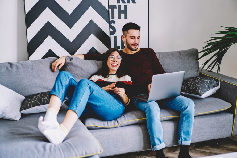 An actor couple watching holiday movies .