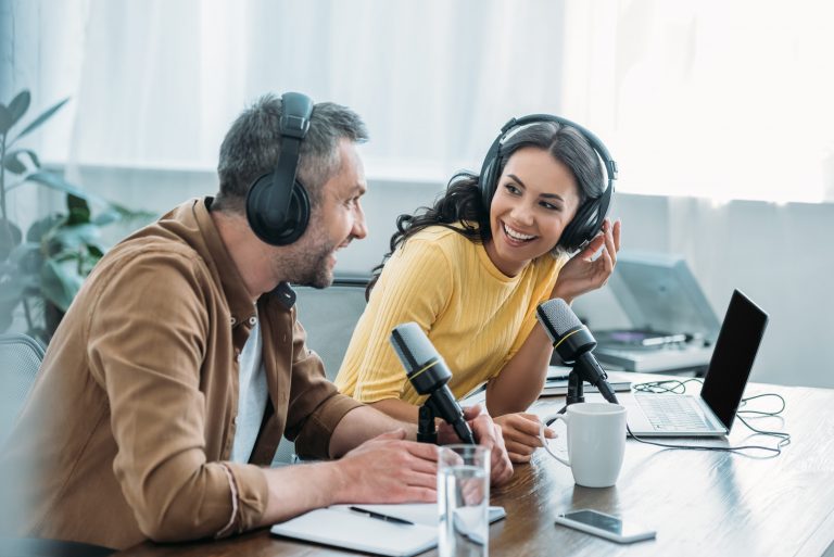 Two podcasters in the middle of recording a show. Here's what it's like to be in their shoes.