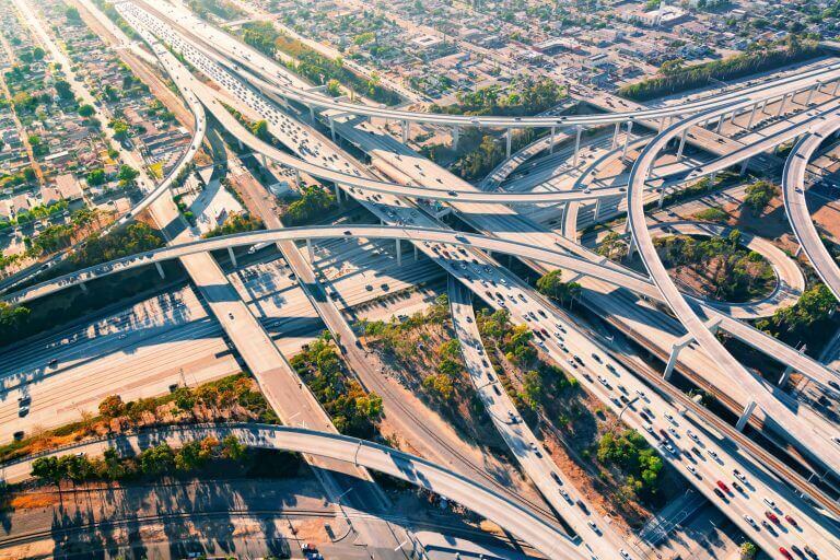 Artios nominees rush to work in heavy traffic.