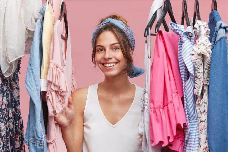 A costumer going through her daily routine of choosing the right outfits for actors to wear on set.