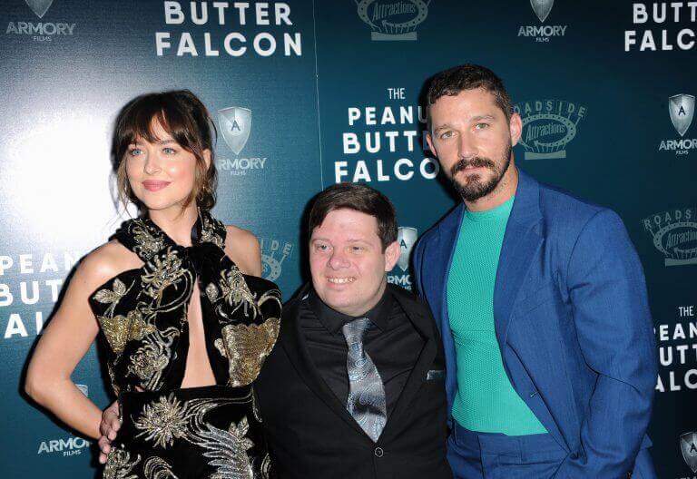 Dakota Johnson, Zack Gottsagen and Shia LaBeouf at the Los Angeles premiere of 'The Peanut Butter Falcon' a prime example of inclusion wins in Hollywood.