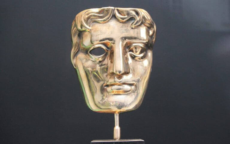 London, UK - June 19th 2018 : Bafta (British Academy film and television awards) award statue trophy on display stock, photo, photograph, picture, image press