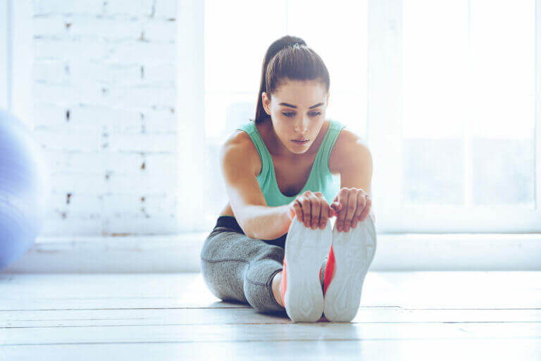 An actress implementing the warm-up routine she created.