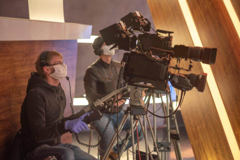 A production crew filming during COVID 19 learning some tips on how to film during these trying times.