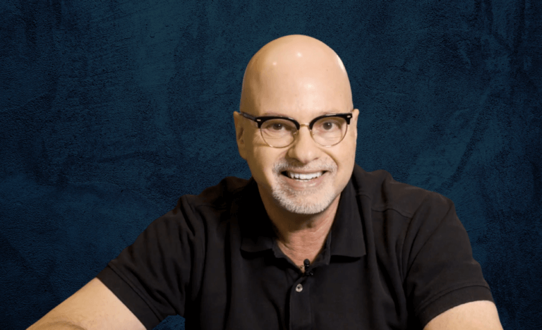Howard Fine wearing glasses