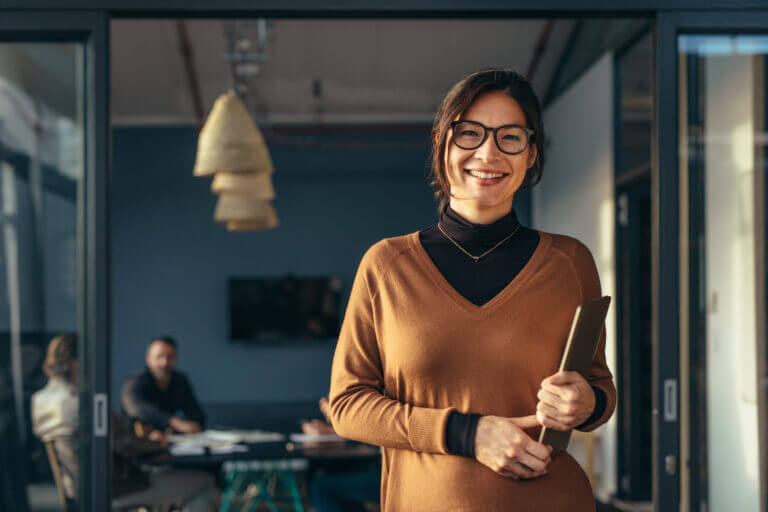 A casting director looking accomplished as she just made sure that she's created a safe casting space and a safe casting experience for actors before they audition.