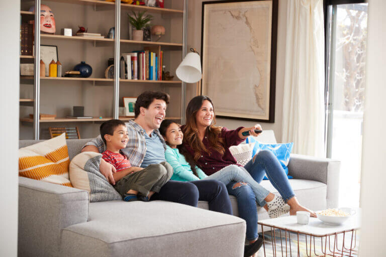 An actor and her family enjoying some of the new movies streaming this month on our list.