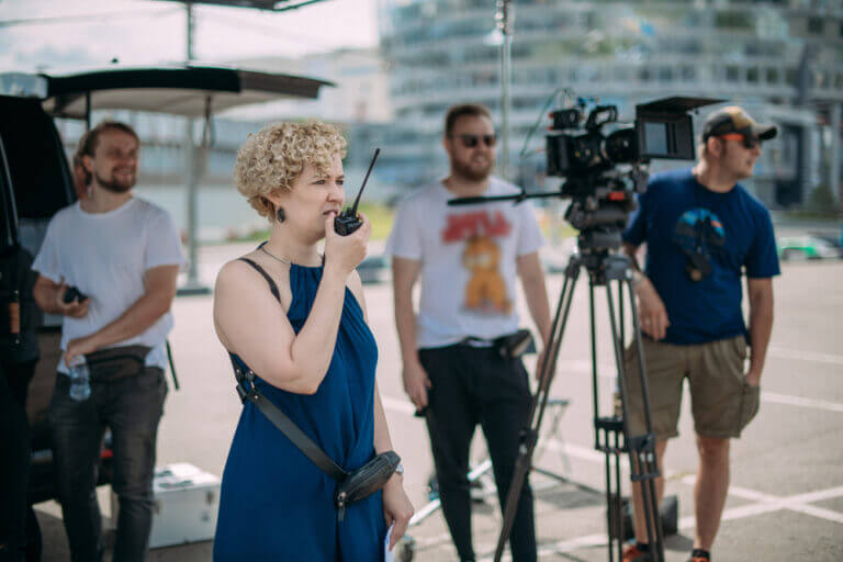 A project creator with the production crew that she was able to hire thanks to Casting Network's advice.