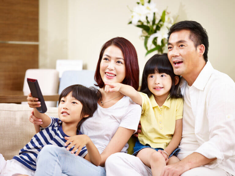 An actor and his family watching several shows on streaming services. All of these can't-miss shows are new this month.