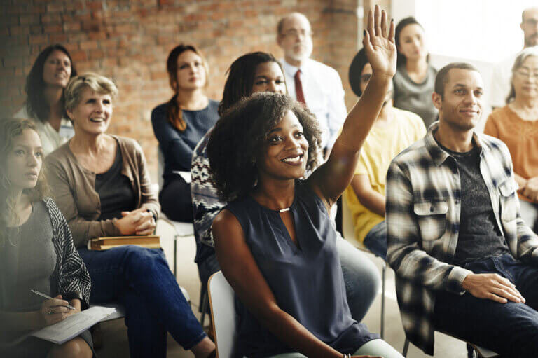 An actress taking a training class for work. Shes's recently gained power in the arts and wants to make sure she's an effective leader.