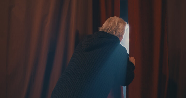 An actor experiencing stage fright before he goes out to perform.