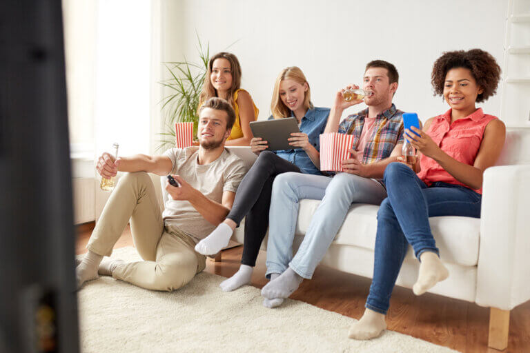 Friends watching one of our December series picks.