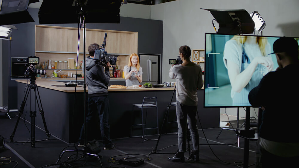 A production team learning about set life.