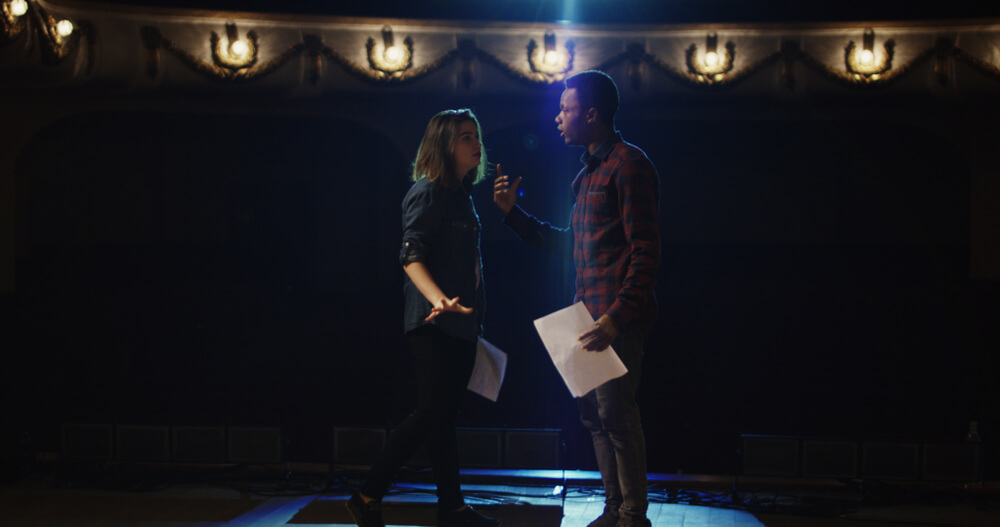 Two actors during rehearsal, both have their own tips for getting ready for rehearsal.