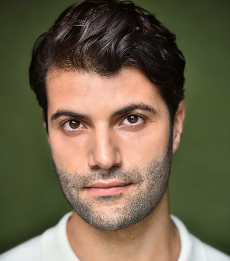 Tiktok influencer, actor and creator Daniel Peera wearing a white shirt.