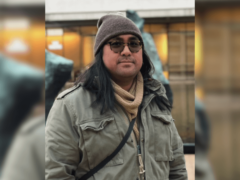 Casting director Geoff Miclat in a warm jacket and beanie outside.