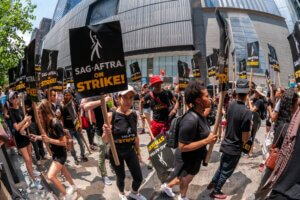 SAG-AFTRA members on strike outside in New York City.
