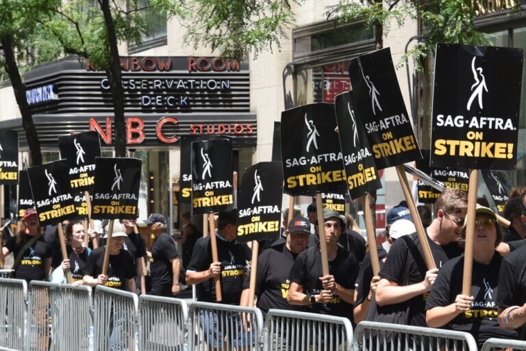 SAG-AFTRA members striking outside NBC studios in New York City.