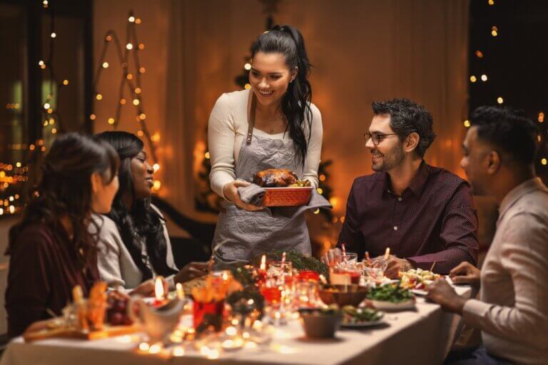 Diverse group of friends having a holiday dinner.