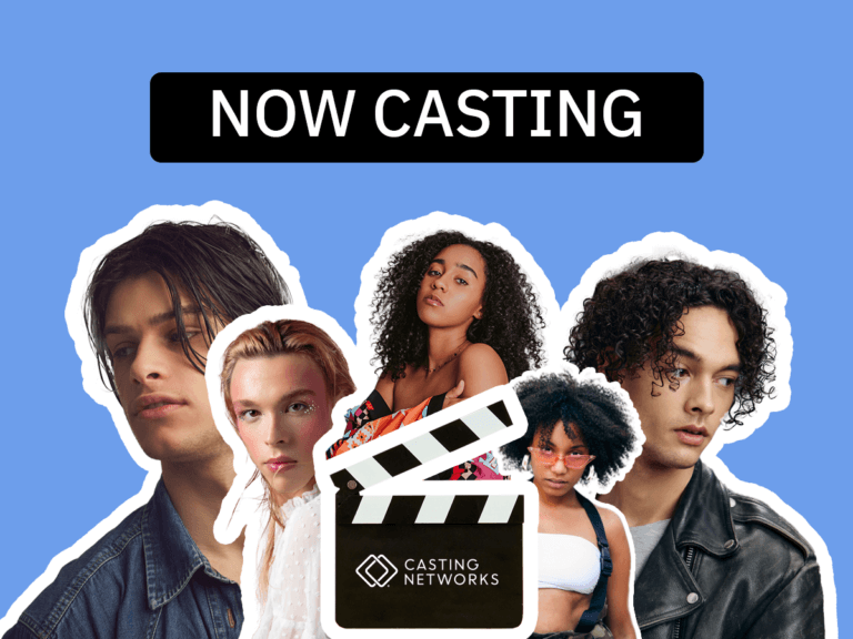 A group of diverse actors in fun poses behind a clapper.