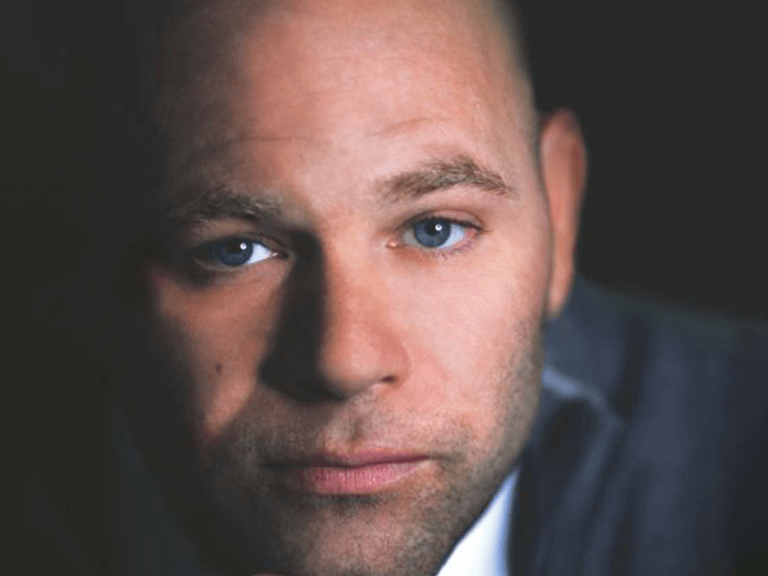 Actor Domenick Lombardozzi looking into the camera.