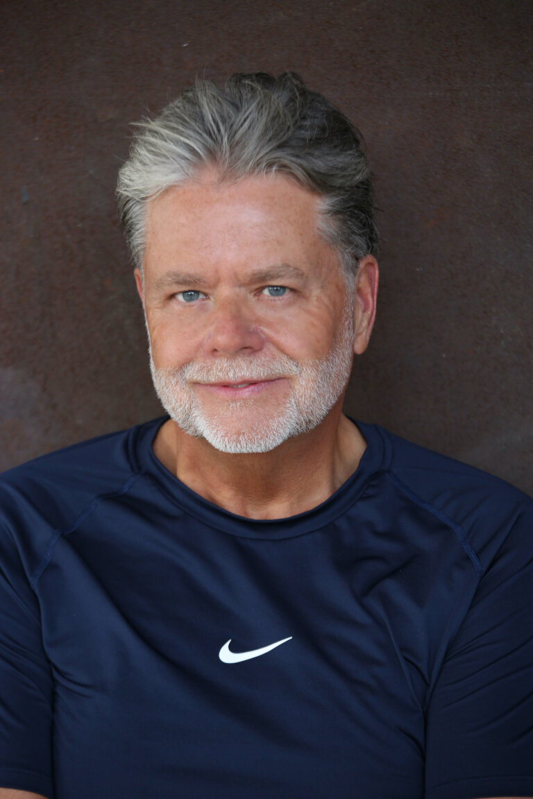 Jack Skidmore smiling in a Nike shirt.