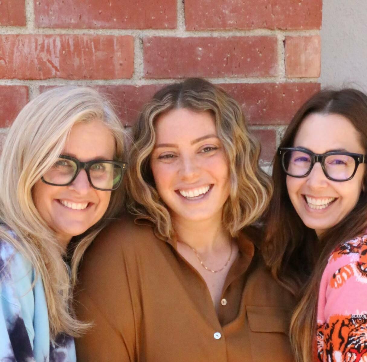 Alexis Frank Koczara, Christine Smith Shevchenko, and Gianna Butler smiling.