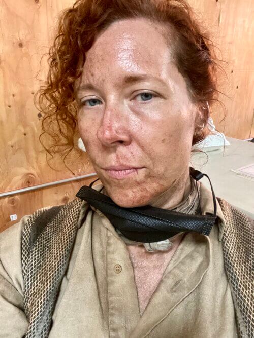 Christina Largent in a steampunk villager costume on the set of Rebel Moon.