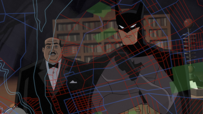 Batman and Alfred inside looking at computer screens.