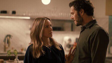 Adam Brody and Kristen Bell looking at each other romantic in an apartment in Netflix's 'No One Wants This.'