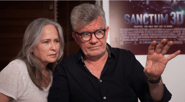 Casting director Gregory Apps and Robyn Gibbes teaching a class in a theater.