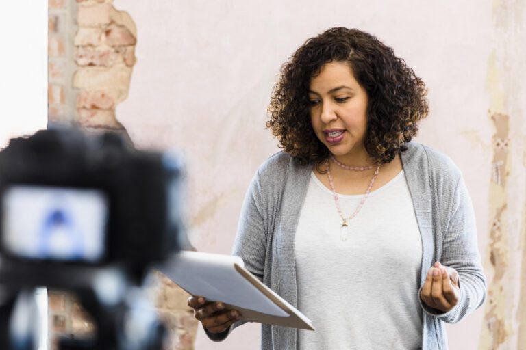 Spanish actor reading a script for the audition of a role she has been typecast in.