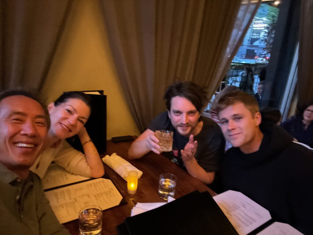 Tinpo Lee and the cast of Final Destination: Bloodlines having drinks and rehearsing the script at someone's house.