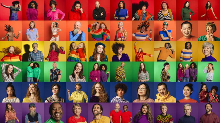 A montage of a diverse group of individual portraits forming a pride flag.