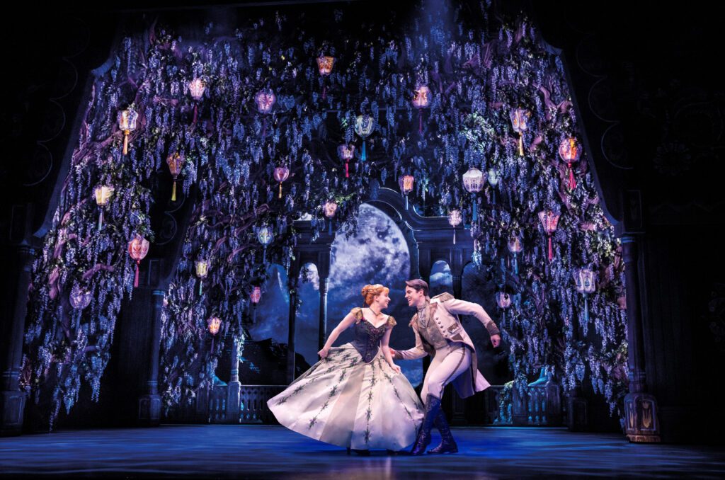 Laura Dawkes as ‘Anna’ alongside Oliver Ormson as ‘Hans’ in ‘Frozen the Musical’