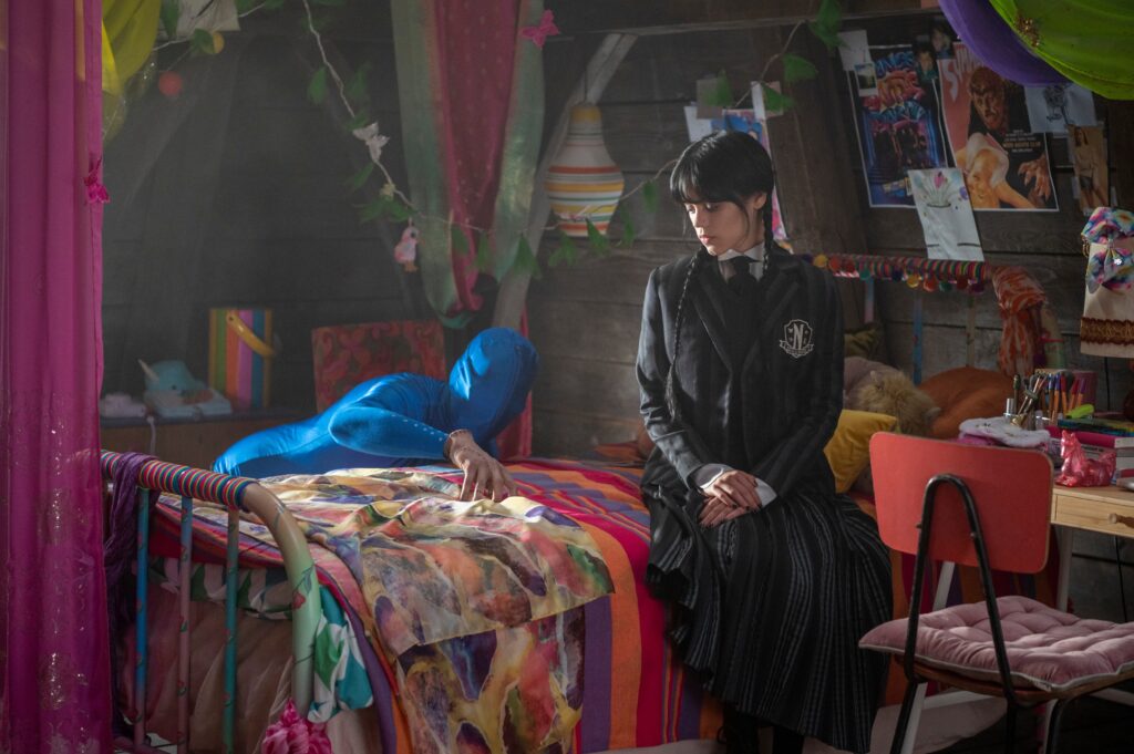Victor Dorobantu as ‘Thing’ with Jenna Ortega as ‘Wednesday’ on the set of ‘Wednesday’ (Season One)